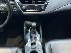 2021 Toyota Corolla 1.2T S-CVT Elite, белый — фото 12