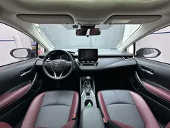 2021 Toyota Corolla TNGA 1.5L CVT GR SPORT, белый — фото 11