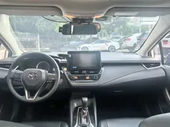 2021 Toyota Corolla 1.2T S-CVT Elite, белый — фото 5