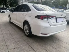 2021 Toyota Corolla 1.2T S-CVT Elite, белый — фото 9