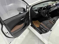 2021 Toyota Corolla 1.2T S-CVT Elite Plus, белый — фото 7