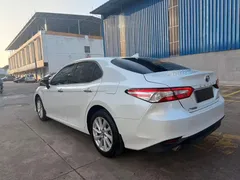2023 Toyota Camry Hybrid 2.5HGVP Advanced, белый — фото 7