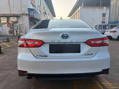 2023 Toyota Camry Hybrid 2.5HGVP Advanced, белый — фото 8