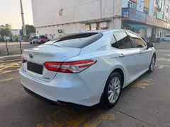 2023 Toyota Camry Hybrid 2.5HGVP Advanced, белый — фото 9