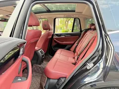 2022 BMW X3 xDrive25i M, чёрный — фото 17
