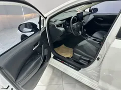 2021 Toyota Corolla 1.2T S-CVT Elite Plus, белый — фото 10