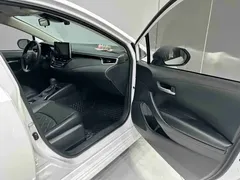 2021 Toyota Corolla 1.2T S-CVT Elite Plus, белый — фото 14