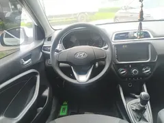 2020 Hyundai Reina 1.4L MT GL, белый — фото 11