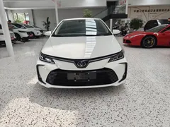 2021 Toyota Corolla 1.2T S-CVT Elite PLUS, белый — фото 2