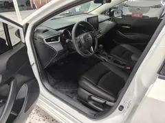2021 Toyota Corolla 1.2T S-CVT Elite PLUS, белый — фото 4