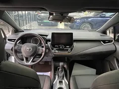 2024 Toyota Levin 185T CVT Luxury, белый — фото 12