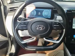 2021 Hyundai Tucson Tucson L 1.5T DCT TOP Flagship — фото 15