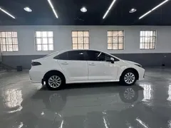 2021 Toyota Corolla 1.2T S-CVT Pioneer, белый — фото 7