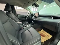 2021 Toyota Corolla 1.2T S-CVT Pioneer, белый — фото 13