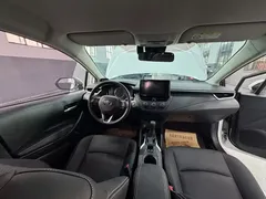 2021 Toyota Corolla 1.2T S-CVT Pioneer, белый — фото 14