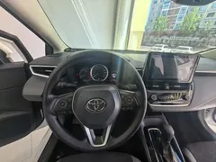 2023 Toyota Corolla 1.2T Elite, белый — фото 11