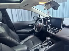 2023 Toyota Corolla 1.2T Elite, белый — фото 14