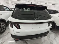 2023 Hyundai Tucson L 1.5T AT 2WD DLX Luxury, белый — фото 6