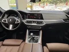 2023 BMW X6 xDrive30i M, чёрный — фото 7