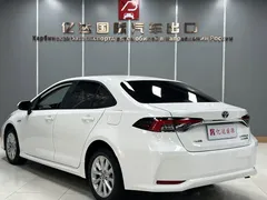 2021 Toyota Corolla Hybrid 1.8L E-CVT Elite, белый — фото 4