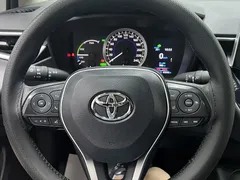 2021 Toyota Corolla Hybrid 1.8L E-CVT Elite, белый — фото 13