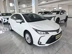 2023 Toyota Corolla 1.2T Elite, белый — фото 2