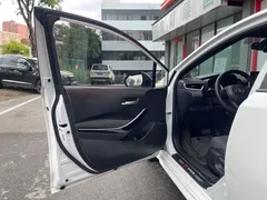 2022 Toyota Levin Hybrid 1.8H E-CVT Luxury, белый — фото 21