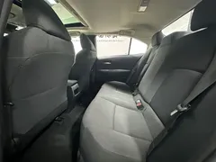 2021 Toyota Corolla TNGA 1.5L CVT Elite, белый — фото 12