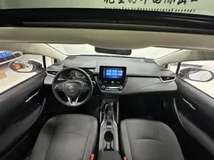 2021 Toyota Corolla TNGA 1.5L CVT Elite, белый — фото 16
