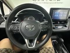 2021 Toyota Corolla TNGA 1.5L CVT Elite, белый — фото 18