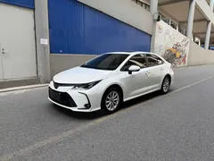 2021 Toyota Corolla 1.2T S-CVT Elite, белый — фото 1