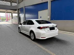 2021 Toyota Corolla 1.2T S-CVT Elite, белый — фото 4