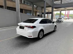 2021 Toyota Corolla 1.2T S-CVT Elite, белый — фото 6