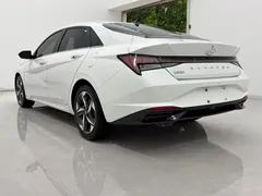 2022 Hyundai Elantra 1.5L CVT LUX Premium, белый — фото 4