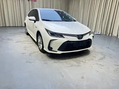2021 Toyota Corolla Hybrid 1.8L E-CVT Elite, белый — фото 3