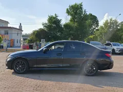2022 BMW 3 Series 325i M, чёрный — фото 11