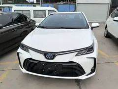 2021 Toyota Corolla Hybrid 1.8L E-CVT Elite, белый — фото 2