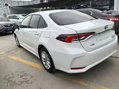 2021 Toyota Corolla Hybrid 1.8L E-CVT Elite, белый — фото 4