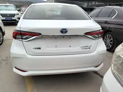 2021 Toyota Corolla Hybrid 1.8L E-CVT Elite, белый — фото 5