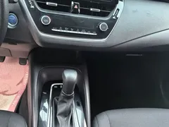 2021 Toyota Corolla Hybrid 1.8L E-CVT Elite, белый — фото 9