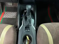 2023 Toyota Corolla 1.8L Smart Hybrid Elite, белый — фото 13