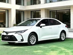 2021 Toyota Corolla 1.2T S-CVT Luxury, белый — фото 1