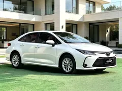 2021 Toyota Corolla 1.2T S-CVT Luxury, белый — фото 3