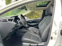 2021 Toyota Corolla 1.2T S-CVT Luxury, белый — фото 14