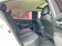 2021 Toyota Corolla 1.2T S-CVT Luxury, белый — фото 17