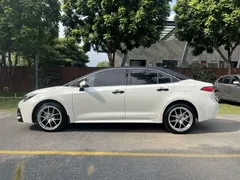 2021 Toyota Levin 185T CVT Luxury, белый — фото 11