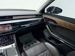 2021 Audi A8L 55 TFSI quattro, чёрный — фото 11