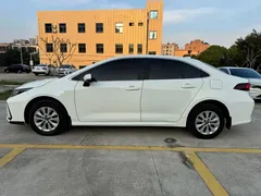 2021 Toyota Corolla 1.2T S-CVT Pioneer, белый — фото 4