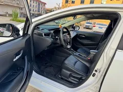 2021 Toyota Corolla 1.2T S-CVT Pioneer, белый — фото 8