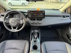 2021 Toyota Corolla 1.2T S-CVT Pioneer, белый — фото 10